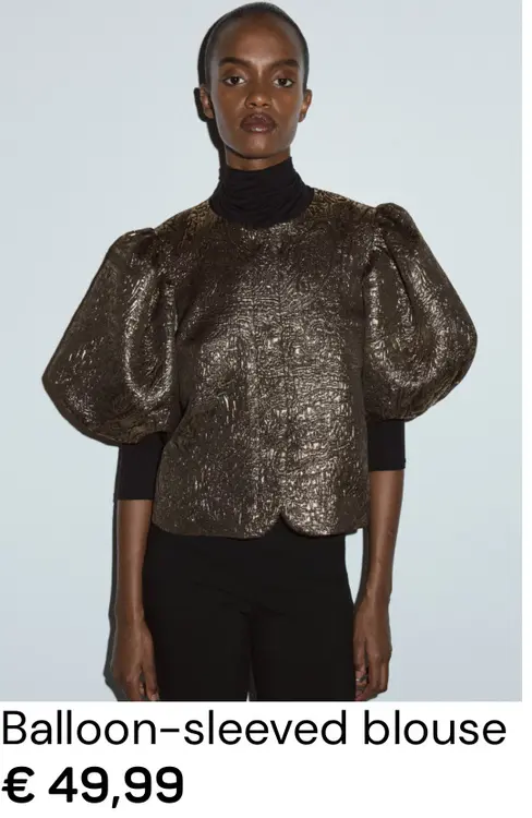 Aanbieding: Balloon-sleeved blouse