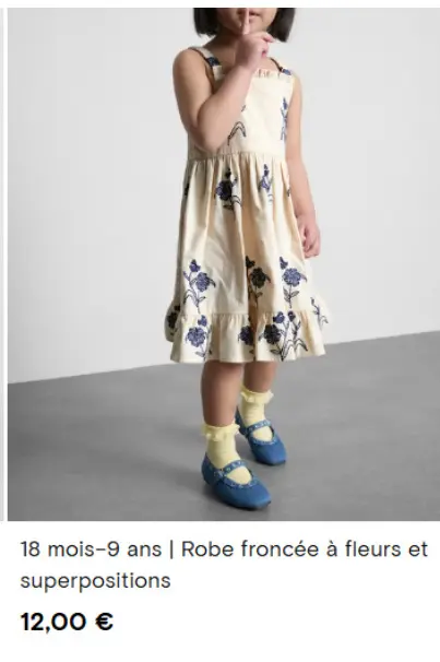 Offre: Robe froncée à fleurs et superpositions