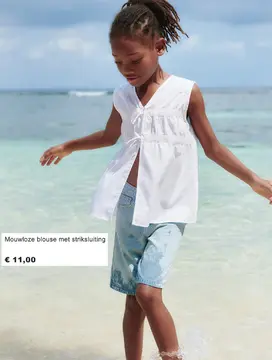 Aanbieding: Mouwloze blouse met striksluiting