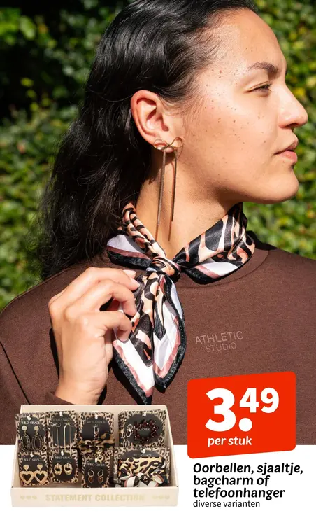 Promotie: Wild Grace Oorbellen, sjaaltje, bagcharm of telefoonhanger